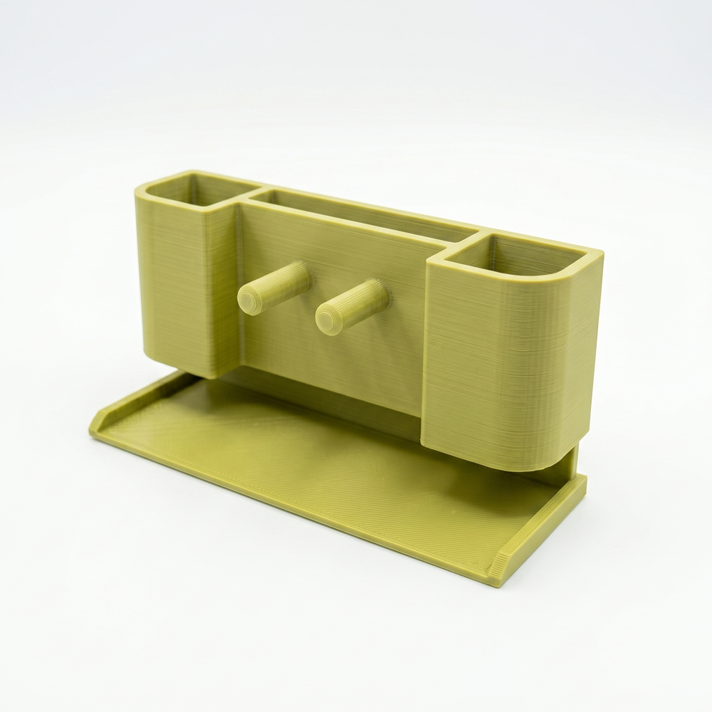 Green desk organizer with multiple compartments on a white background